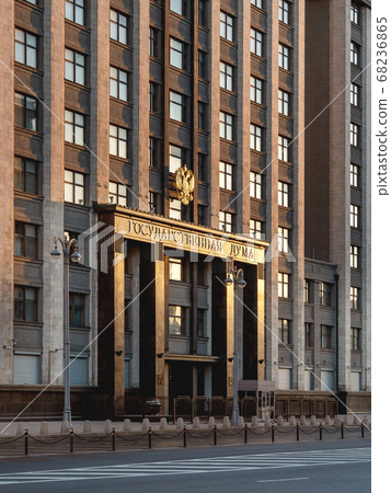Building of State Duma of Russia (inscribed - State Parliament). Deserted Okhotny Ryad street. Moscow, Russia. Building of State Duma of Russia (inscribed - State Parliament). Deserted Okhotny Ryad street. Moscow, Russia. 68236865