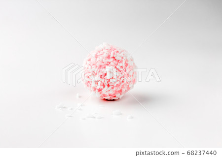 pink chocolate candy on a white background. candy ball macro. isolate 68237440