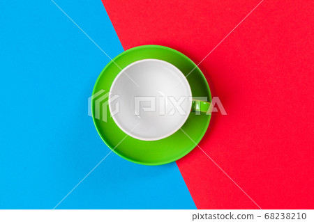 cup of coffee and saucer on color background cup of coffee and saucer on color background 68238210