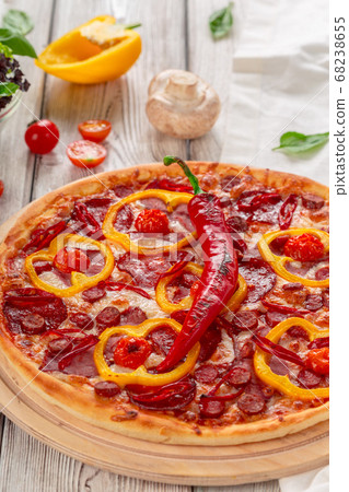 Homemade cheese pizza with salami. creative photo. 68238655