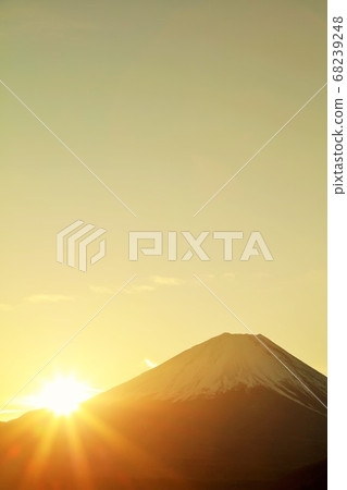 The rising sun: Mount Fuji and the sun at dawn The rising sun: Mount Fuji and the sun at dawn 68239248