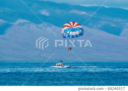 Image of parasailing at Kaanapali Beach, Hawaii 68240317