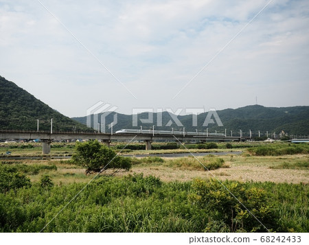 N700 Series Mizuho crossing the Sanyo Shinkansen Chikusa River Bridge N700 Series Mizuho crossing the Sanyo Shinkansen Chikusa River Bridge 68242433