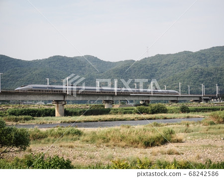 Sanyo Shinkansen 500 series Kodama across the Chikusa River Bridge 68242586