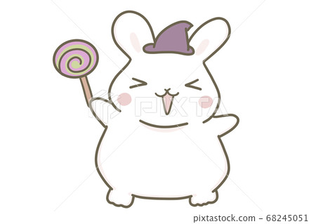 Rabbit having a lollipop and enjoying Halloween 68245051
