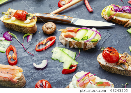 Italian bruschetta with vegetables. 68245305