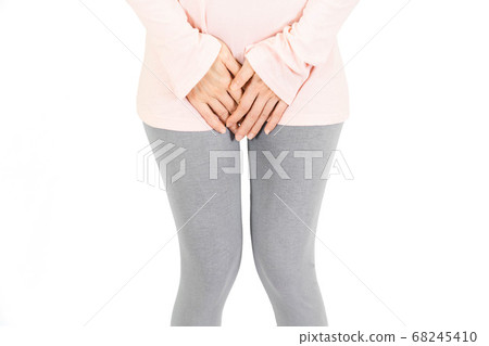 Cropped of woman put her hand on the genitalia area, Penis pain or Itching urinary Health-care concept on white background Cropped of woman put her hand on the genitalia area, Penis pain or Itching urinary Health-care concept on white background 68245410