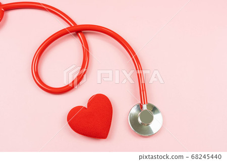 Red stethoscope and heart isolated on pink background,health care concept 68245440