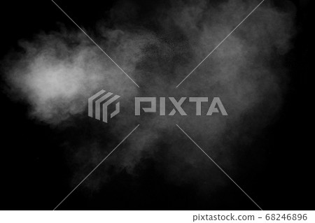 White powder explosion clouds.Freeze motion of white dust particles splash on black background. White powder explosion clouds.Freeze motion of white dust particles splash on black background. 68246896