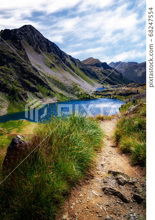 Mountain path to lakes of Vens (France) Mountain path to lakes of Vens (France) 68247554