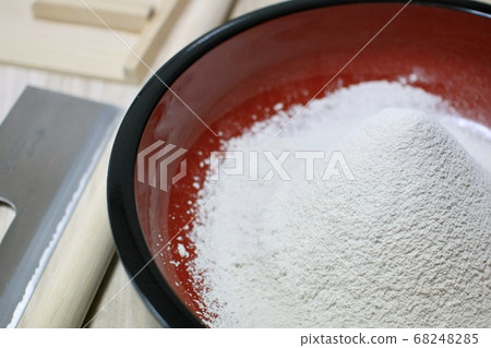 Buckwheat flour and rolling pin before soba making Buckwheat flour and rolling pin before soba making 68248285