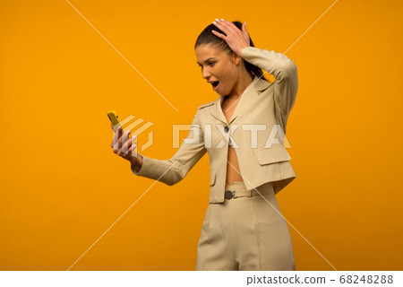 Young girl with facial skin problems posing with a Young girl with facial skin problems posing with a 68248288