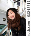 Woman on a boat heading to Miyajima 68248811