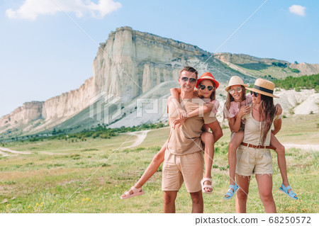 Happy family on vacation in the mountains Happy family on vacation in the mountains 68250572