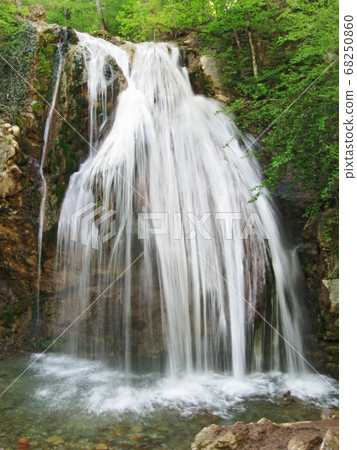 Waterfall Jur-Jur in Crimea water motion in spring 68250860