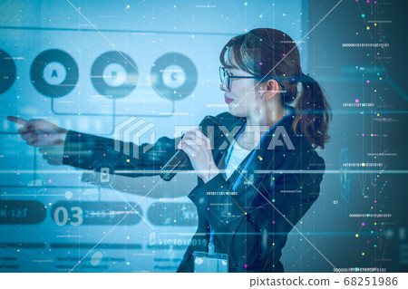 A woman giving a presentation 68251986