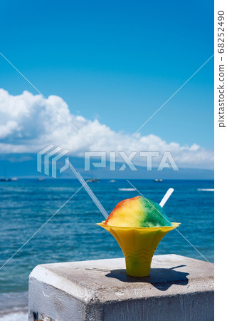 Shaved ice in the background of the ocean of Maui, Hawaii Shaved ice in the background of the ocean of Maui, Hawaii 68252490