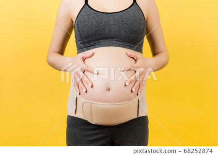 Close up of elastic maternity band dressed on Close up of elastic maternity band dressed on 68252874