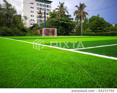 Football field, astro turf surface. Close up of Football field, astro turf surface. Close up of 68253748