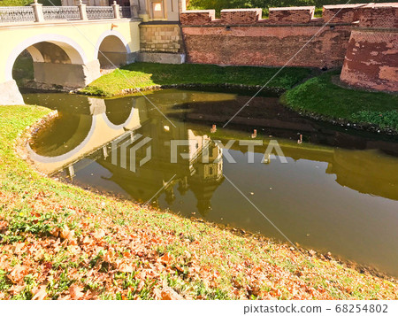 A large red brick earthen wall is strong 68254802