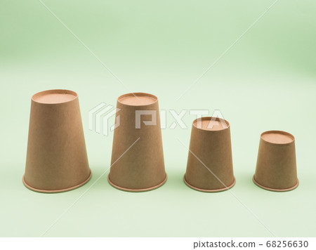 Eco-friendly cookware on a green background. 68256630