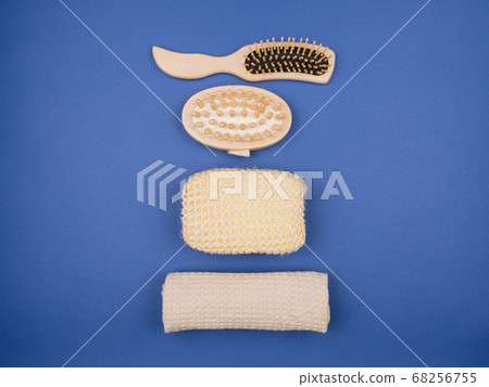 Personal hygiene items for the bathroom on a blue 68256755