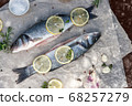 Fresh fish, Seabass, seasoned with spices, garlic and salt. 68257279