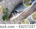 Fresh fish, Seabass, seasoned with spices, garlic and salt. 68257287