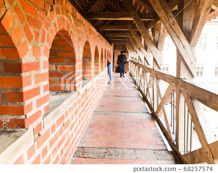 Large long old brick balcony with red brick Large long old brick balcony with red brick 68257574