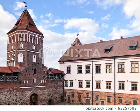 Tall steeples and towers, the roof of an old 68257592