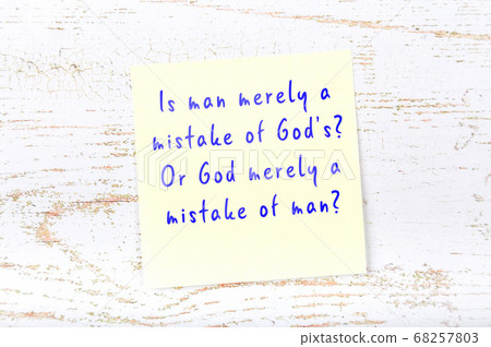 Wise quote on sticky note on wooden wall  68257803