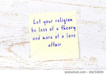 Yellow sticky note on wooden wall with wise quote Yellow sticky note on wooden wall with wise quote 68258089