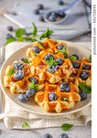 Homemade waffles with berries 68258848