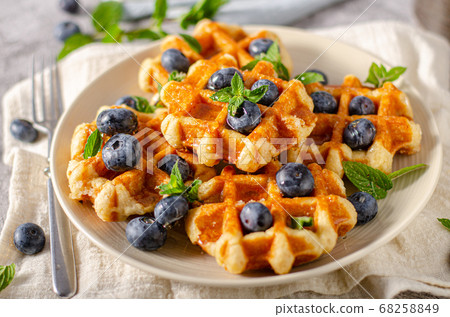 Homemade waffles with berries 68258849