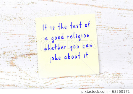 Yellow sticky note on wooden wall with wise quote Yellow sticky note on wooden wall with wise quote 68260171
