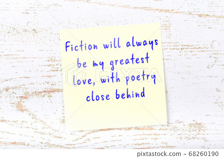 Wise quote on sticky note on wooden wall  68260190