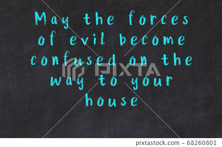 Chalk inscription of smart quote on black desk Chalk inscription of smart quote on black desk 68260801