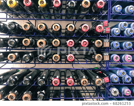 A lot of multi-colored metal cylinders with paint A lot of multi-colored metal cylinders with paint 68261253