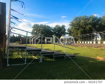 A small stadium with wooden low stands for fans 68261787