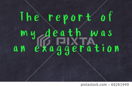 Chalk inscription of smart quote on black desk Chalk inscription of smart quote on black desk 68261949