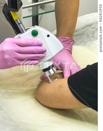 A cosmetologist, a specialist doctor, conducts A cosmetologist, a specialist doctor, conducts 68261950