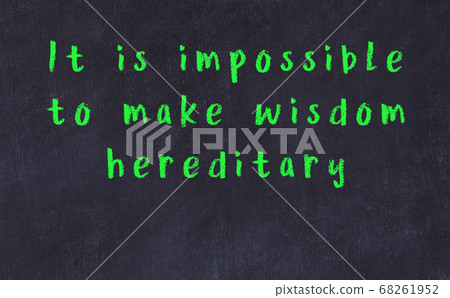 Black chalkboard with wise inscription on it Black chalkboard with wise inscription on it 68261952