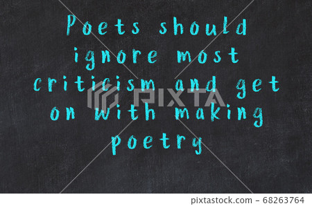 Chalk inscription of smart quote on black desk Chalk inscription of smart quote on black desk 68263764