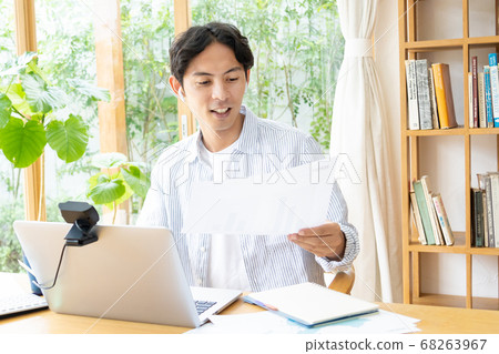 Teleworking young man Teleworking young man 68263967