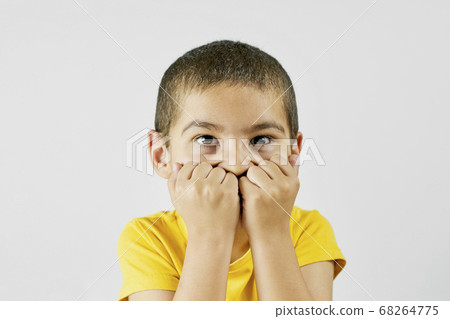 Portrait of frustrated middle eastern boy Portrait of frustrated middle eastern boy 68264775