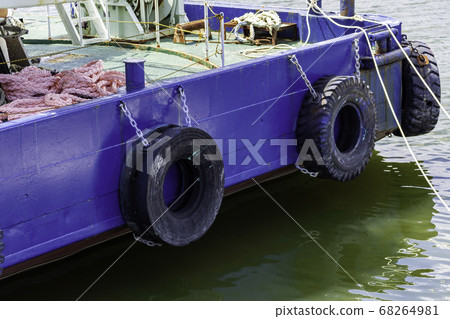 Boat with crane, old tire for docking, Otoshima fishing port, Kurashiki city, Okayama prefecture Boat with crane, old tire for docking, Otoshima fishing port, Kurashiki city, Okayama prefecture 68264981