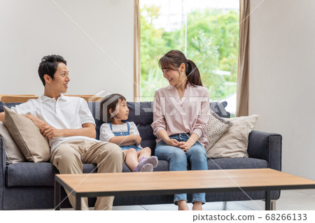 Parents chatting in the living room 68266133