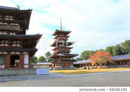 West tower and Kondo of Nara Yakushiji Temple in late autumn West tower and Kondo of Nara Yakushiji Temple in late autumn 68266198