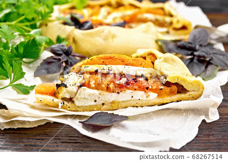 Galeta with tomato and cheese on paper Galeta with tomato and cheese on paper 68267514