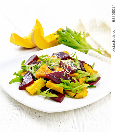 Salad of pumpkin and beetroot in plate 68268034